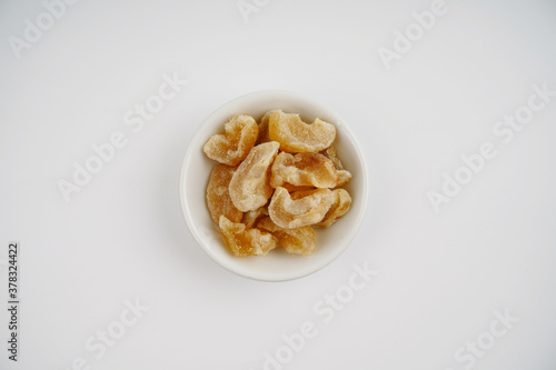 gooseberry candy in White bowl over white background 