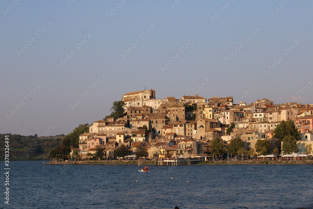 Lake bracciano and historical town of Anguillara Sabazia near rome italy Lake bracciano and historical town of Anguillara Sabazia near rome italy
