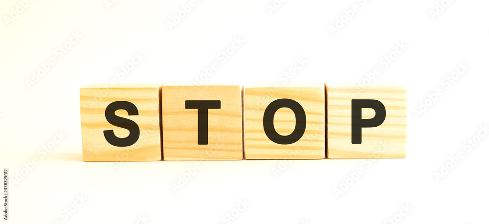 Wooden cubes with letters. For your concept. Wooden cubes on a white background.