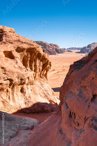 Rocks and sand in the Wadi Rum desert in Jordan on a hot summer day