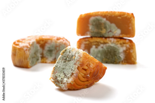 cut out moldy moon cakes on white background