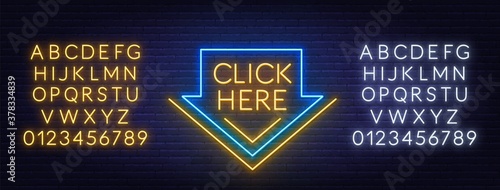 Click here neon sign with arrow on brick wall background. White and yellow neon alphabets.