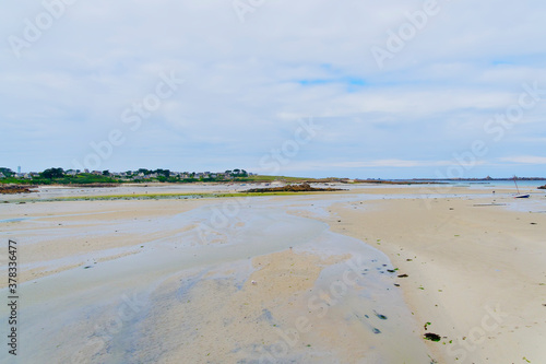 Out across the bay at low tide in the french coastal town of Landunvez, Brittany photo