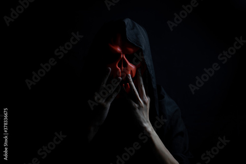 People wearing ghost mask at night, Dark halloween Concept.