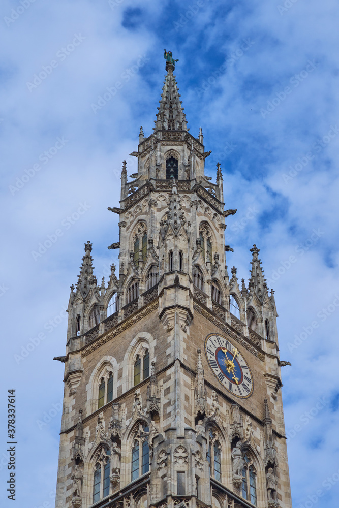 Top of the clock tower of Rathaus, closeup. Detail of the New Town Hall at Marienplatz in Munich