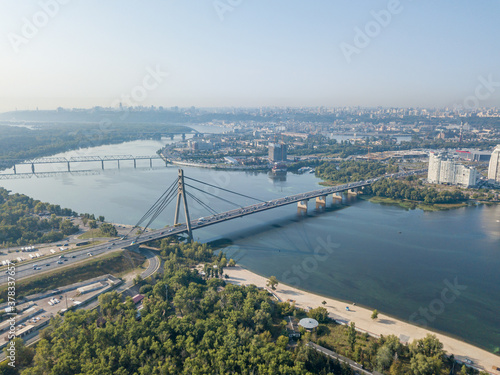 North bridge over the Dnieper river in Kiev. Aerial drone view.