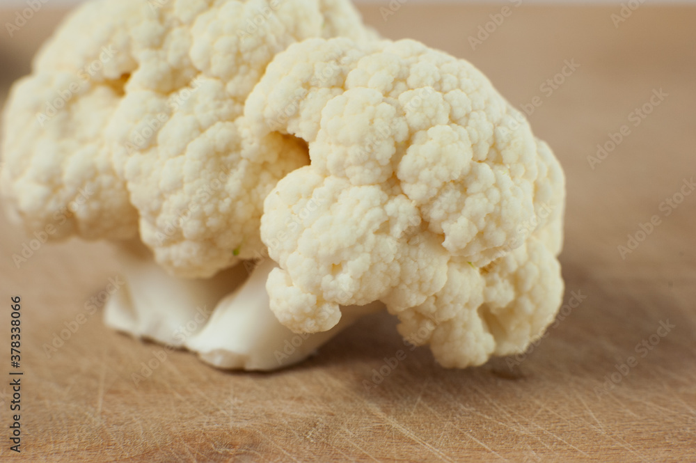 Cauliflower on a wooden Board. Macro photo. Selective focus. Cauliflower on a wooden Board. Macro photo. Selective focus.