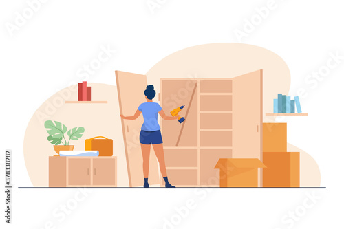 Woman repairing wardrobe with hand drill. Door, wood, assembly flat vector illustration. Furniture and renovation concept for banner, website design or landing web page