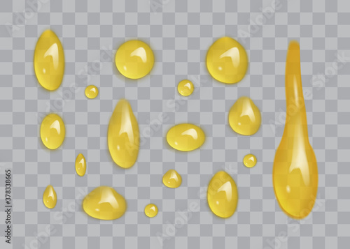 transparent drops of honey isolated on gray background 