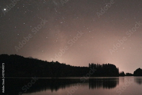 Stars above lake - starry night - Milky Way