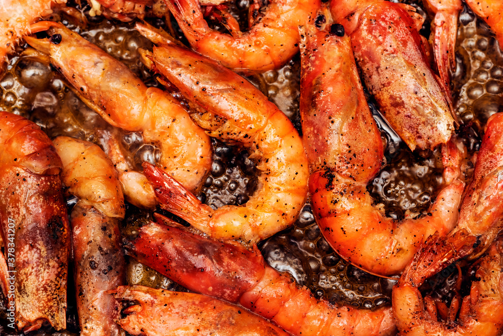Delicious roasted grilled shrimps background Delicious roasted grilled shrimps background