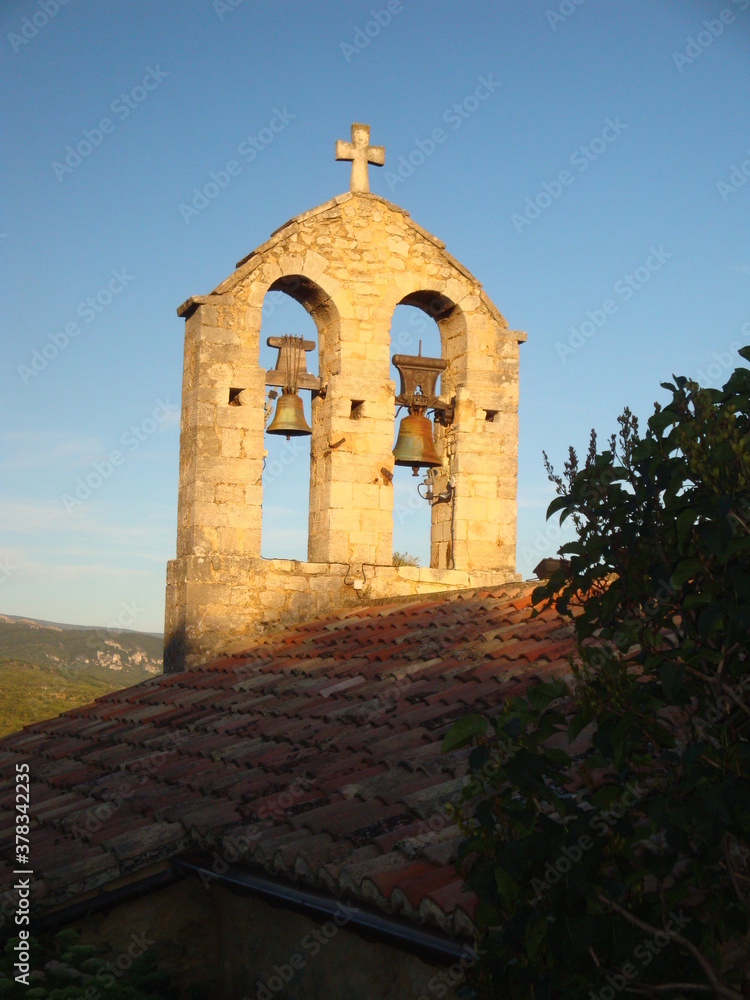 bell tower of the church against blue sky