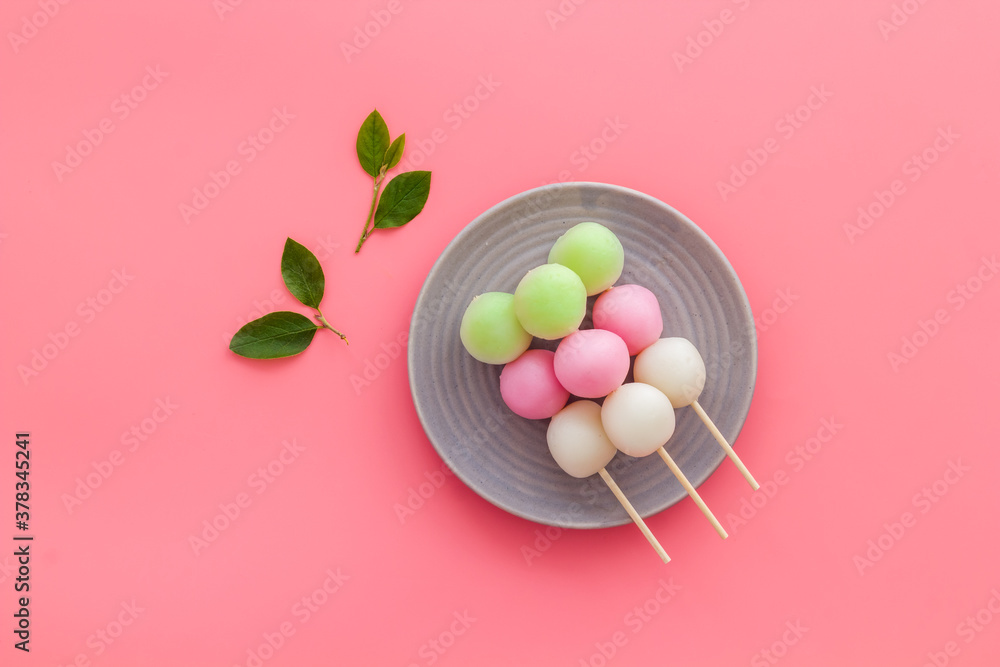 Japanese three colored dumplings Dango on plate, top view Japanese three colored dumplings Dango on plate, top view