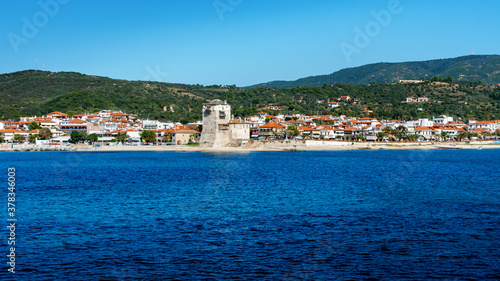 Historic fort in port and city Ouranoupolis , entry site to monasteries of Mount Athos, Chalkidiki, Greece photo