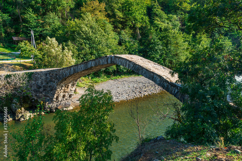 The stone arch bridge over the Ajaristskali river, Dandalo bridge, Georgia © k_samurkas