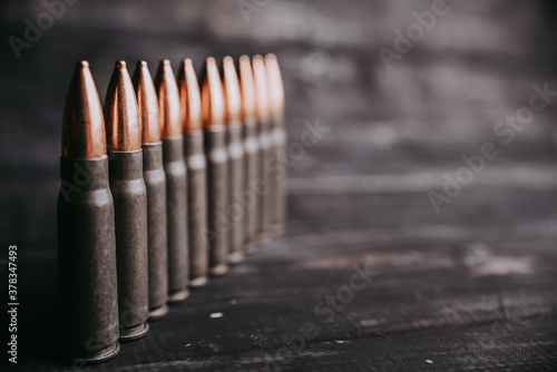Copy space rifle cartridges are in a row. Self-defense concept