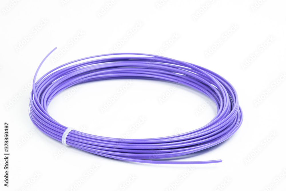 Top view of blue rolled filament plastic for 3D Printing Pen isolated on white. Top view of blue rolled filament plastic for 3D Printing Pen isolated on white.