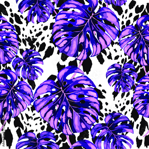 Tropical seamless pattern on animalistic texture. Jungle exotic summer print. Summer tropical leaf. Tropical flower fashion pattern. Floral tropic illustration. Vector seamless pattern.