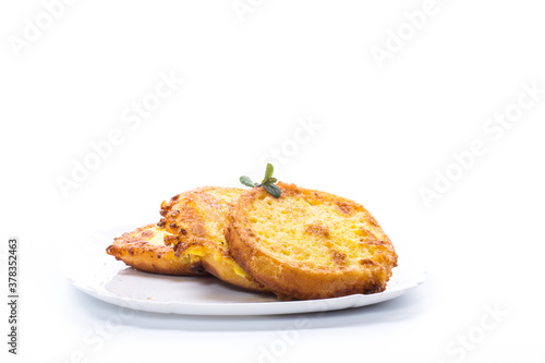 round bread croutons fried in batter in a plate