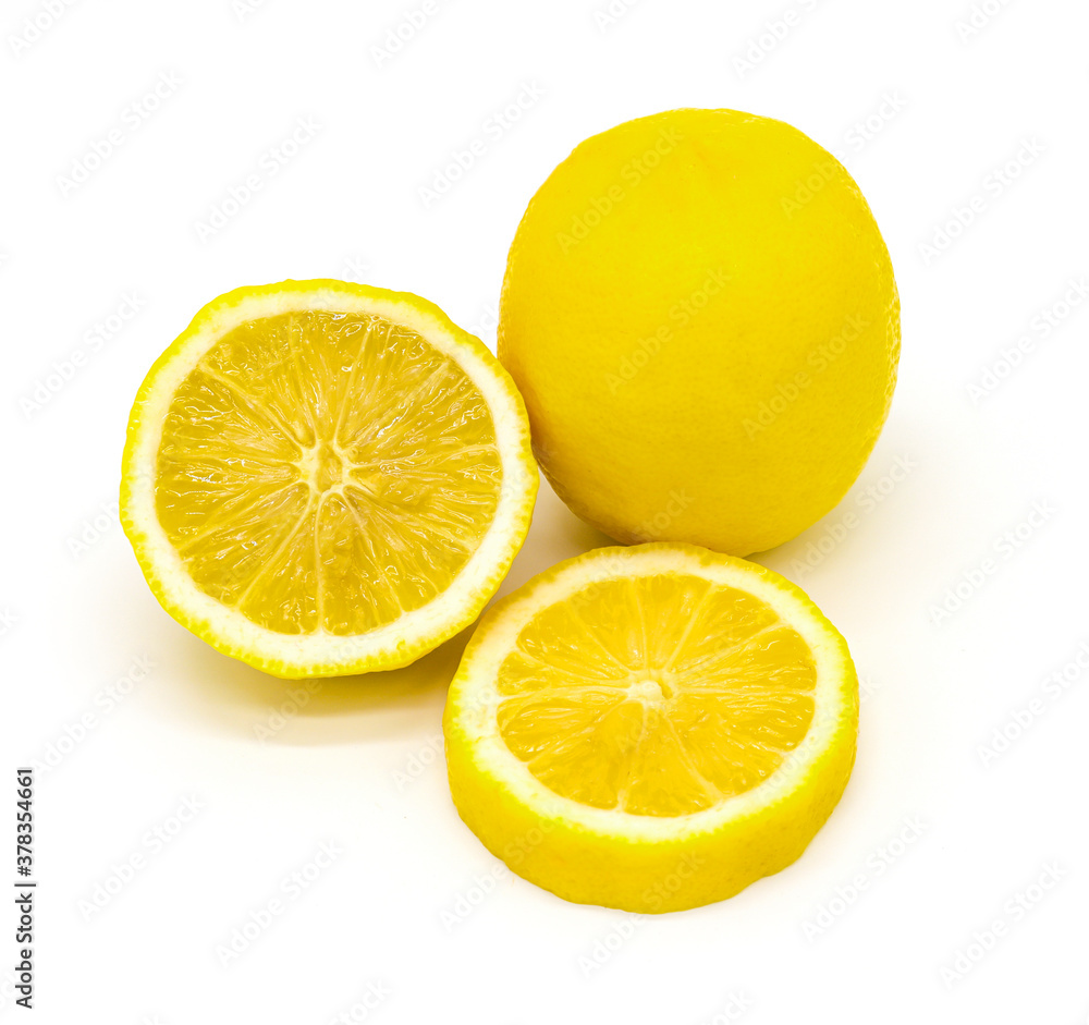 Lemon on a salad leaf on the background