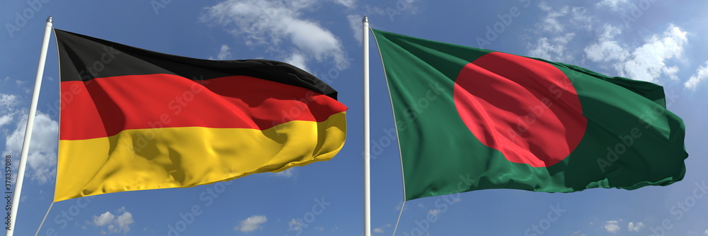 Naklejka premium Flags of Germany and Bangladesh on flagpoles. 3d rendering