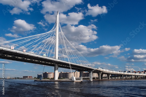 New highway road with cable-stayed bridge with blue sky in Saint Petersburg, Russia. June 14, 2018.
