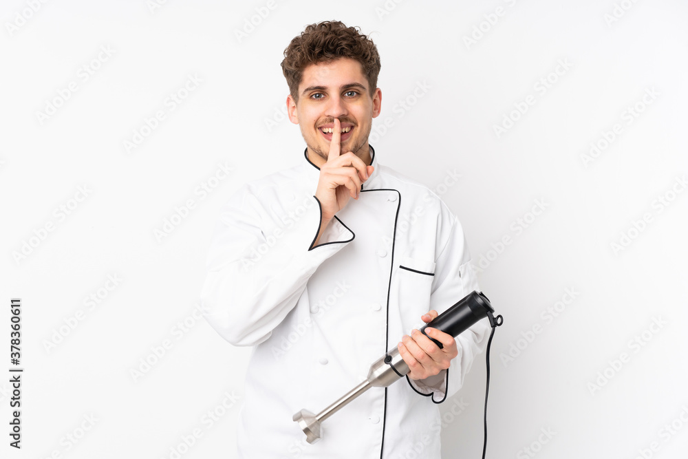 Man using hand blender isolated on white background doing silence gesture