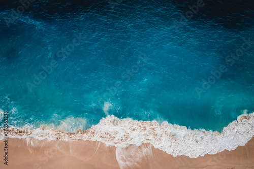 Wild beach, top view, waves