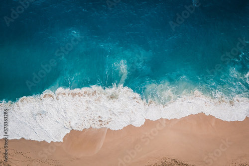 Wild beach, top view, waves