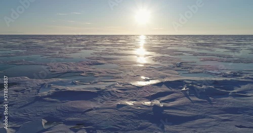 Lake Baikal in winter. The abstract and dense lines of ice. A popular travel destination in Russia. Aerial view of the ice.