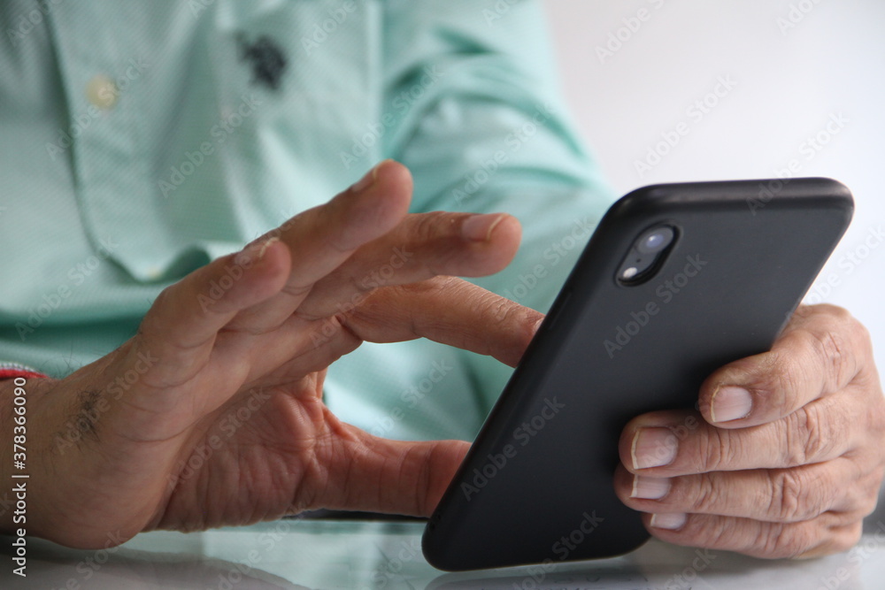 Man working in workplace on mobile in Digital world Man working in workplace on mobile in Digital world