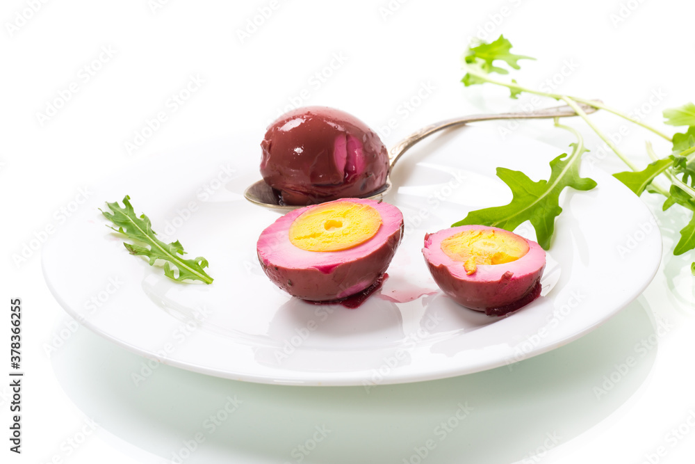 marinated chicken eggs in beetroot marinade in a plate marinated chicken eggs in beetroot marinade in a plate