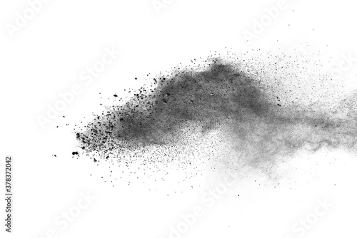 Black powder explosion on white background. 