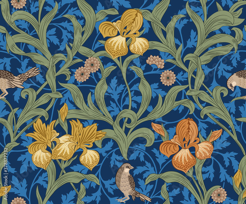 Photo Vintage floral seamless pattern with orange iris and birds on blue background