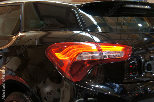 KUALA LUMPUR, MALAYSIA -NOVEMBER 12, 2019: Car tail light or tail lamp. Designed with safety features and will light up when braking. Some of it made from the LED.  © Aisyaqilumar
