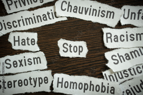 Stop Discrimination sexism homophobia  - Scrap pieces of paper photo