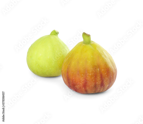 Whole tasty green figs on white background