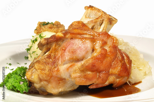 Canvas Print Grilled crusty Pork Knuckle with Sauerkraut - Isolated on white Background