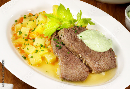 Photography Traditional boiled Beef with green Herb Sauce - German Tafelspitz