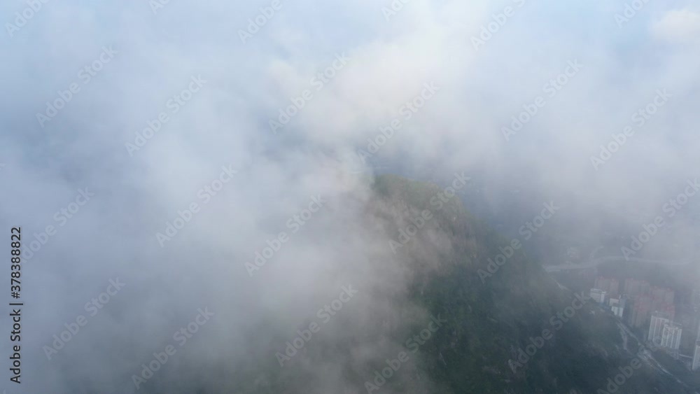High altitude early morning fog over Hong Kong Lion rock mountain ridge, Aerial view. High altitude early morning fog over Hong Kong Lion rock mountain ridge, Aerial view.