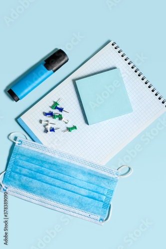 Wallpaper Mural School stationery and medical masks on desk, keep your distance, open school, go back to school for the coronavirus pandemic after being infected 19 Torontodigital.ca