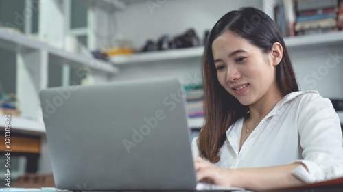 Pregnant woman using laptop, Young expectant lady surfing net, buying goods for newborn. Online shopping.