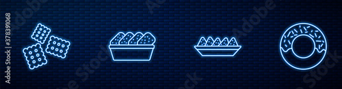 Set line Nachos in plate, Cracker biscuit, Chicken nuggets box and Donut. Glowing neon icon on brick wall. Vector.