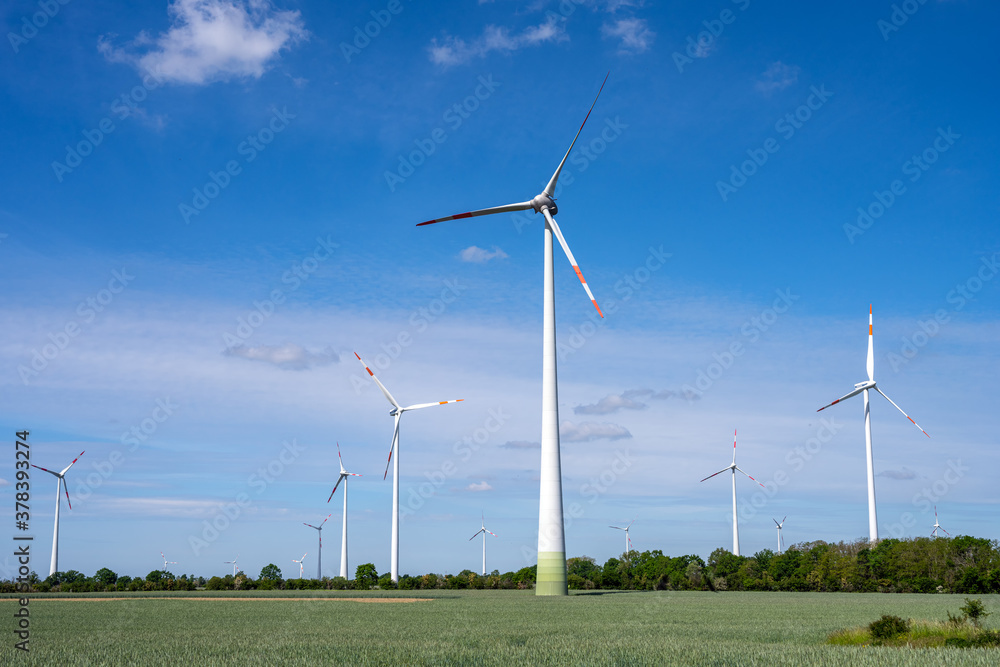 Wind turbines on a sunny day seen in Germany Wind turbines on a sunny day seen in Germany