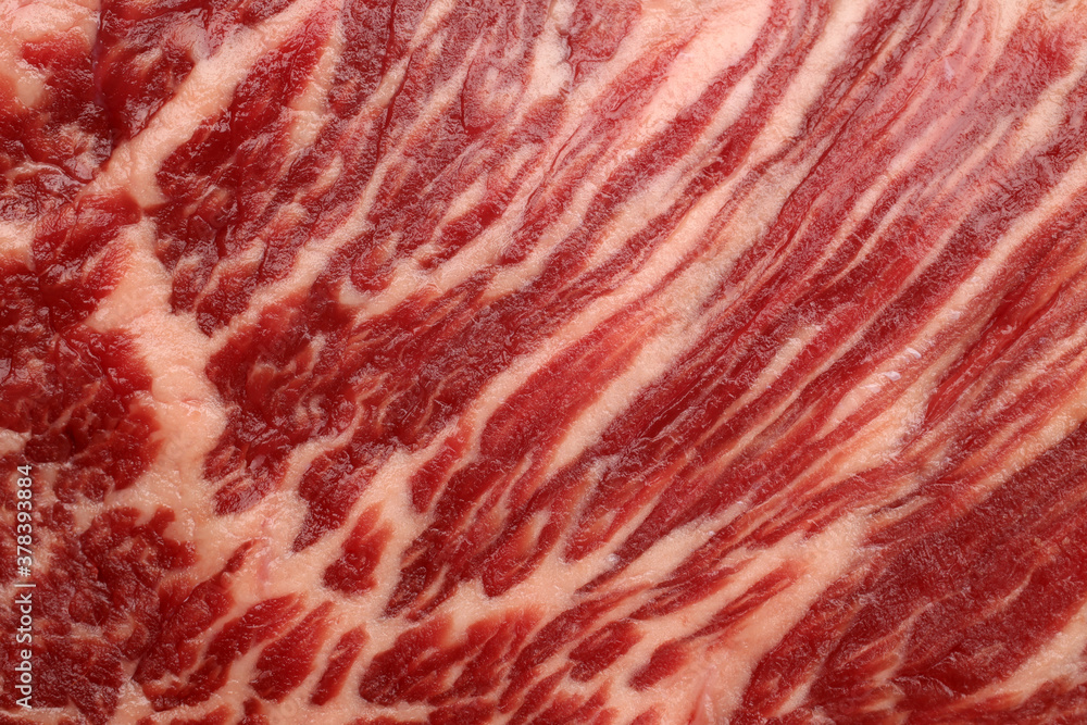 Fresh raw marbled beef meat, for backgrounds or textures Fresh raw marbled beef meat, for backgrounds or textures