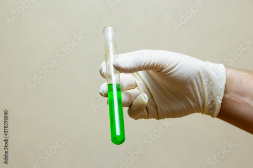 hand holding a syringe