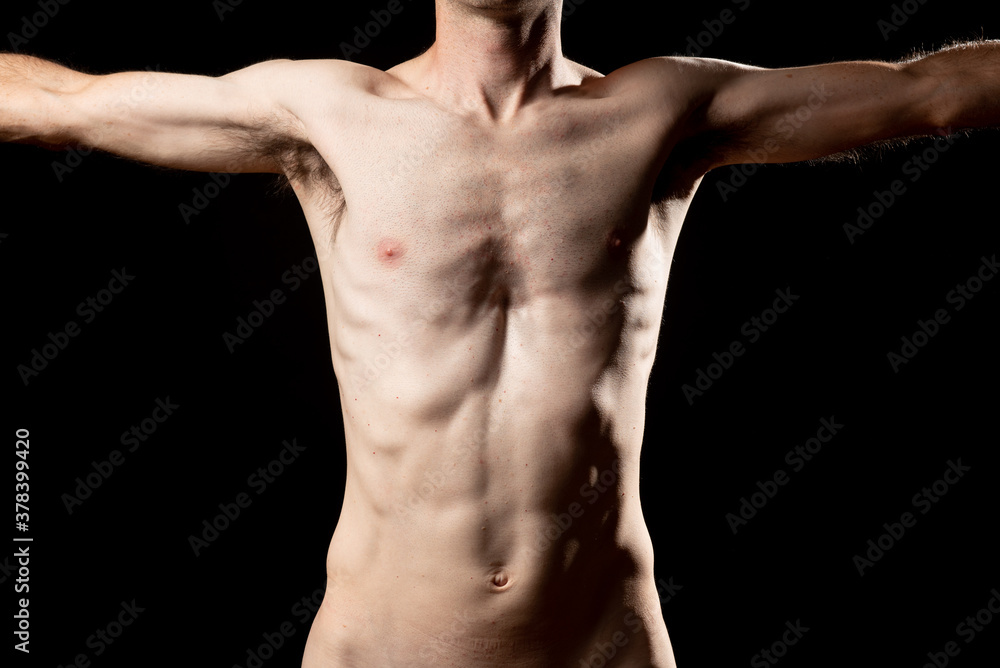A skinny muskular man with funnel or sunken chest, better known in medicine as Pectus Excavatum. Front view with open arms. A skinny muskular man with funnel or sunken chest, better known in medicine as Pectus Excavatum. Front view with open arms.