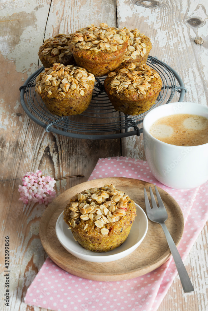 Breakfast muffins with berries, granola and Breakfast muffins with berries, granola and turmeric, studio shot Breakfast muffins with berries, granola and Breakfast muffins with berries, granola and turmeric, studio shot