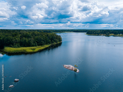 Aerial view of clouds over Vuoksi river with clear line of horizon in background photo