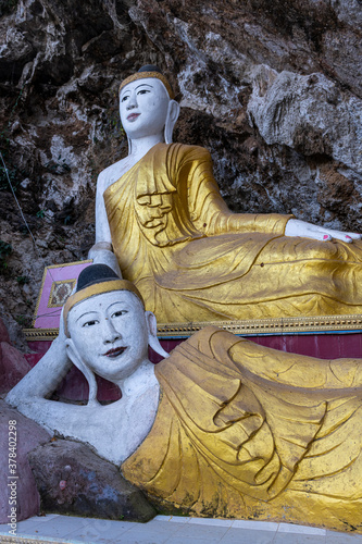 Myanmar, Kayin State, Hpa-an, Buddha statues inside Kaw Ka Thawng Cave photo
